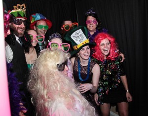 A group of people has Plenty of room for up to 35 people in the CKE Photo Booth.