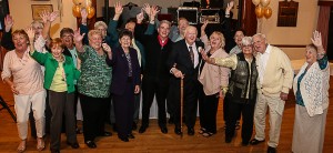 16 members of the Lions stand posing for a photo http://www.e-clubhouse.org/sites/billerica/ Billerica Lions roar at the celebration of Brian Friberg - Senior of the year - Billerica, MA 01821 - 5-1-15
