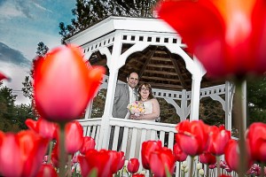 Bride and groom in a gazeebo.   Boston wedding DJ, JP, Photographer, Uplights, Video for Wedding for Mike and Nicole!
