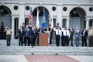 Members of Billerica government as well as Military personnel salute and show their respect as the Star Spangled Banner is played during the 2015 Billerica, MA Memorial Day Observance Celebration.