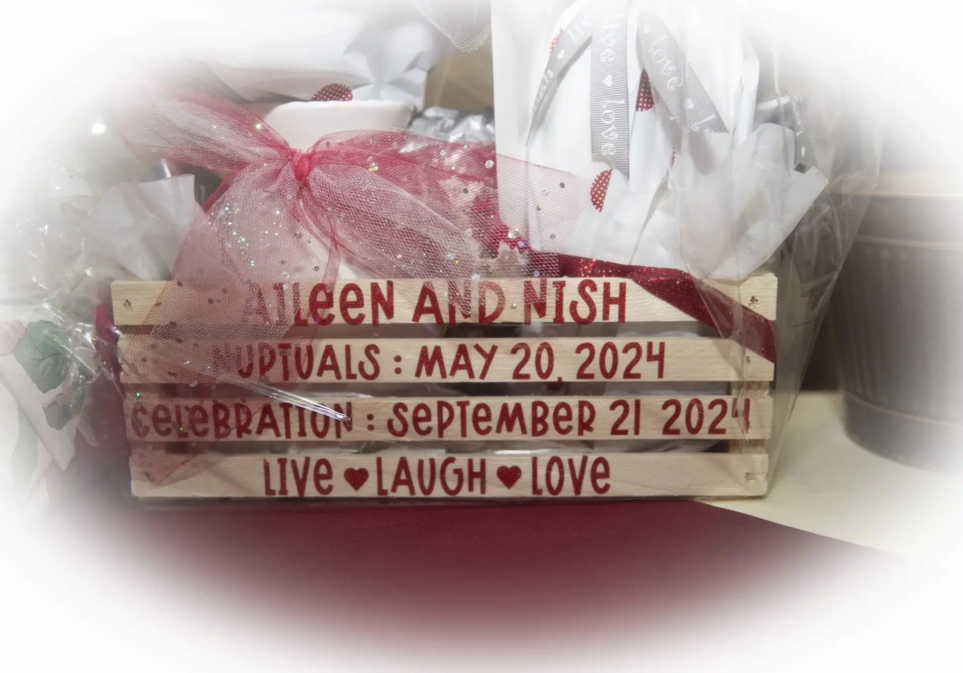 A stack of wooden blocks with the names and dates of each block.